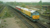 May be an image of train and railway