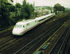 May be an image of 1 person, train, railway and text