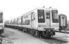 May be an image of train, railway and text